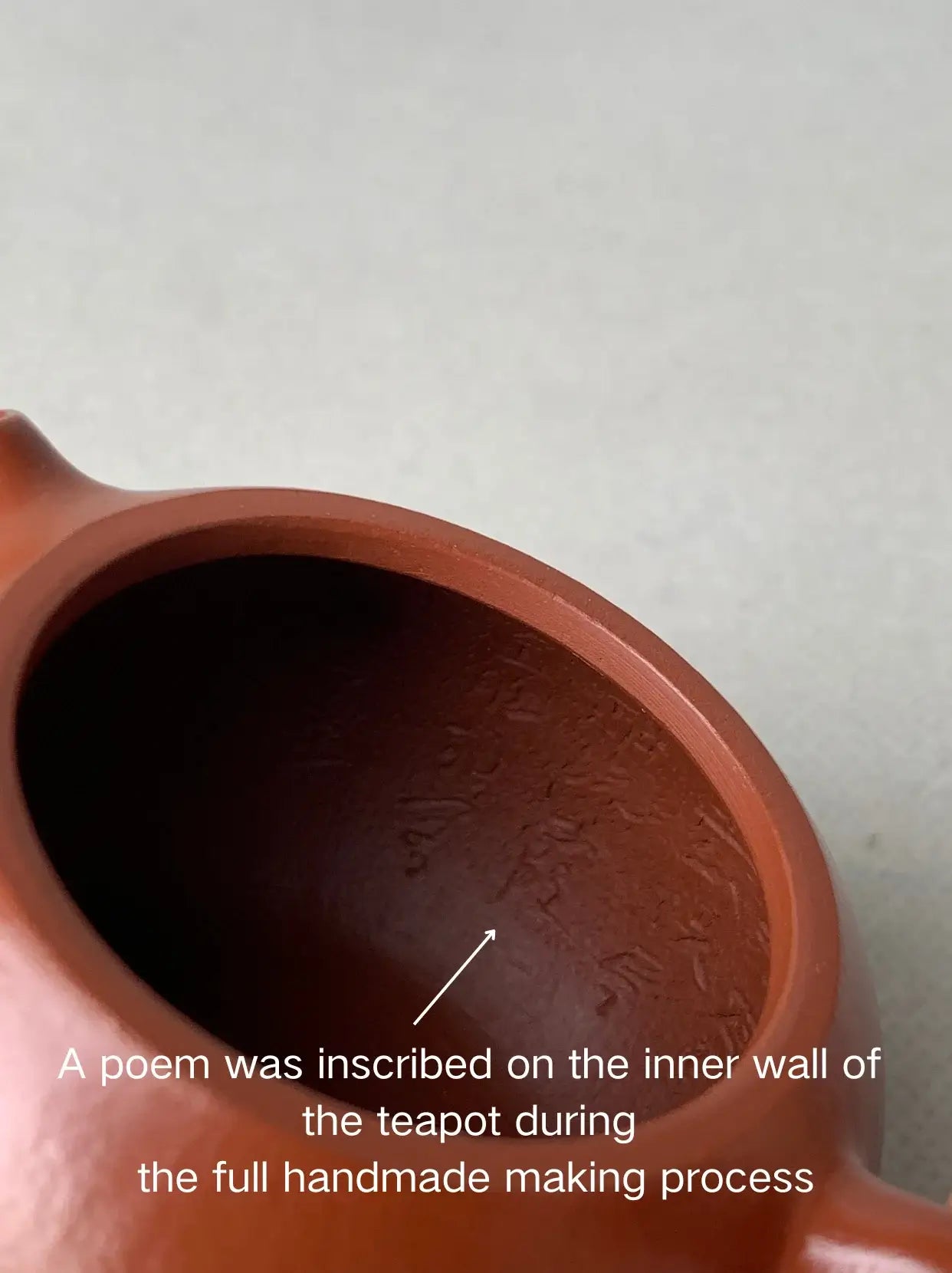 A poem was inscribed on the teapot during the full handmade making process