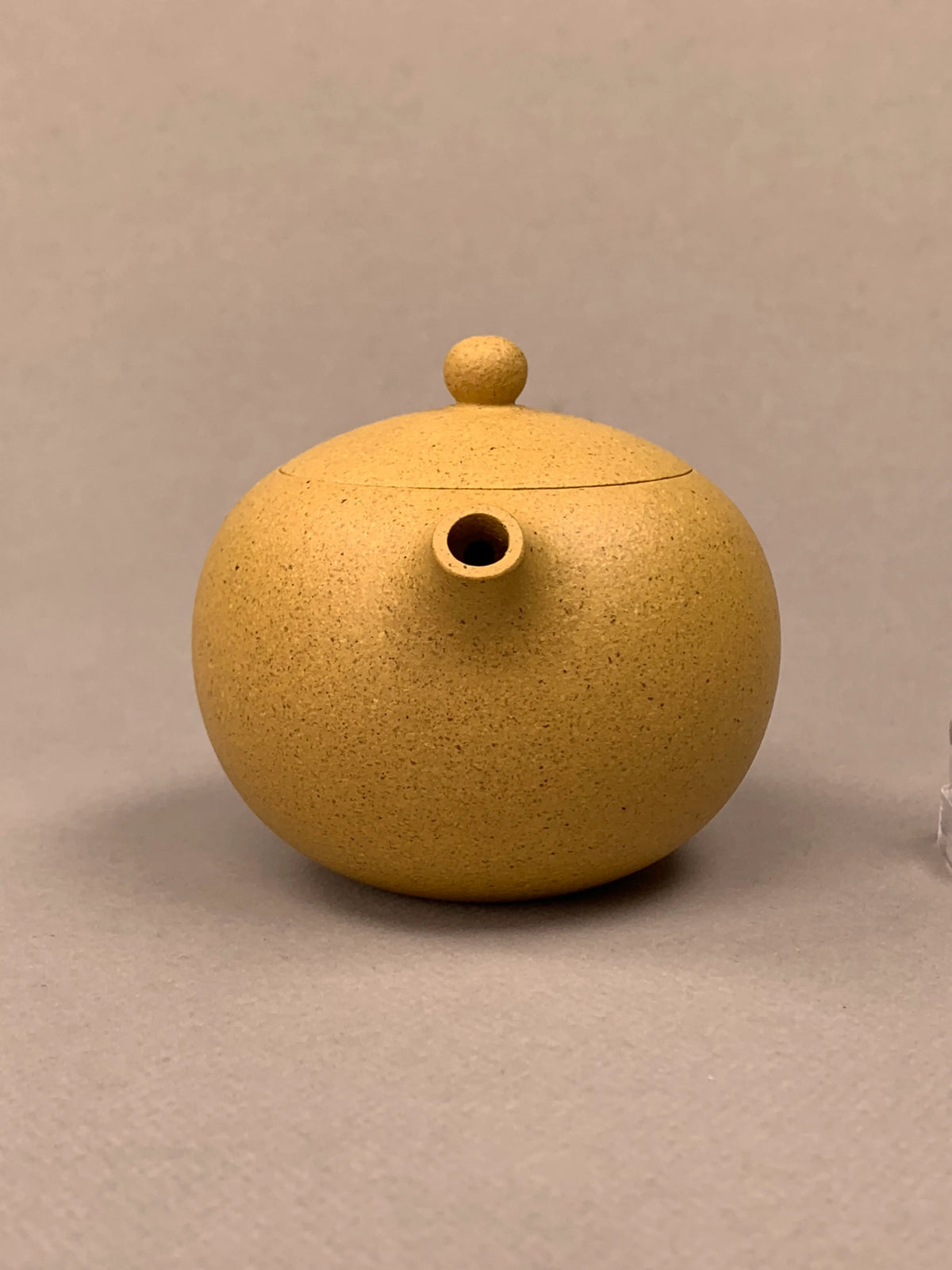 yixing tea pots xi shi on the table side view