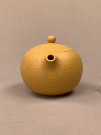 yixing tea pots xi shi on the table side view