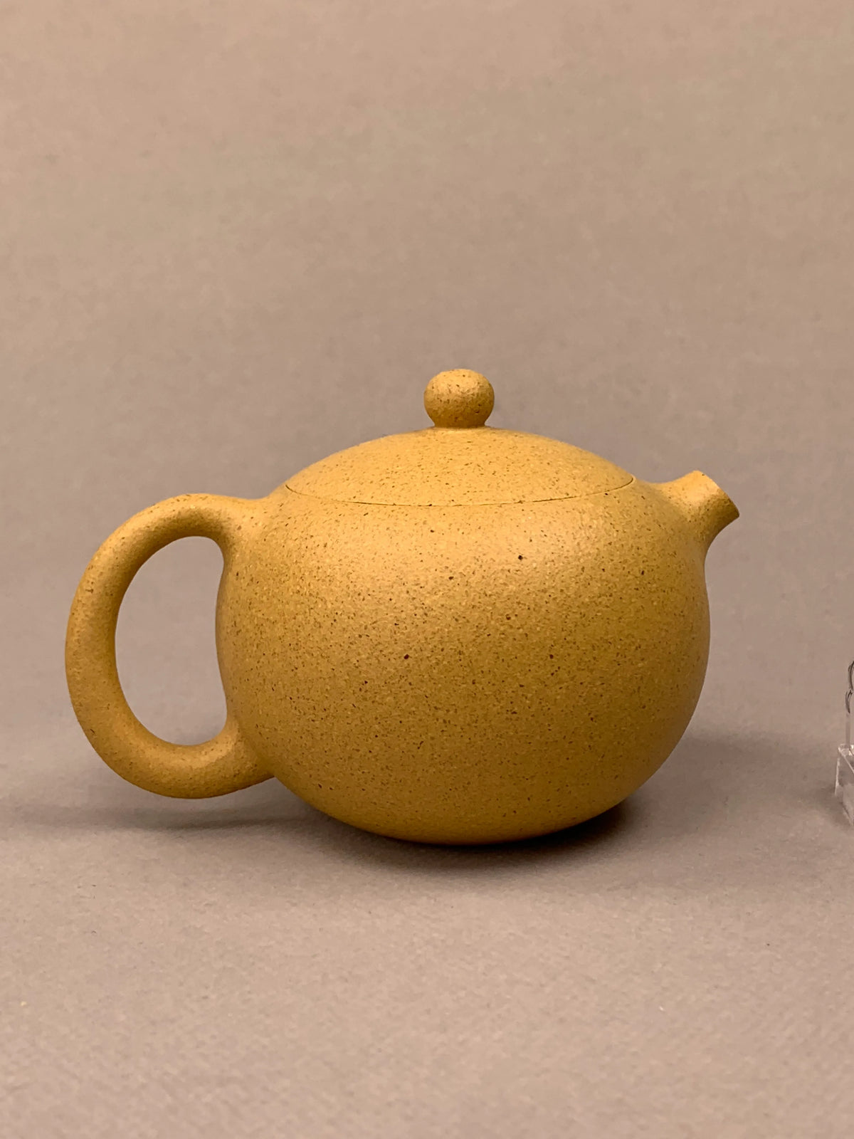yixing tea pots xi shi on the table back view