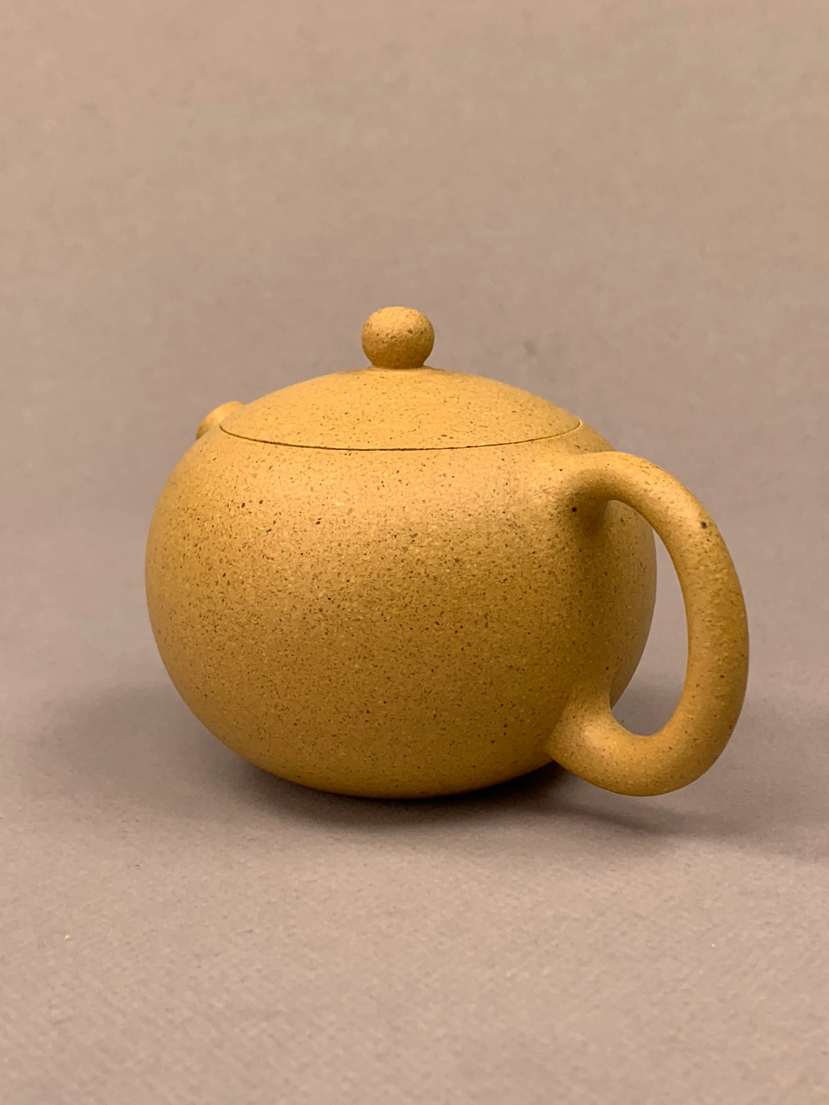 yixing tea pots xi shi on the table left side view