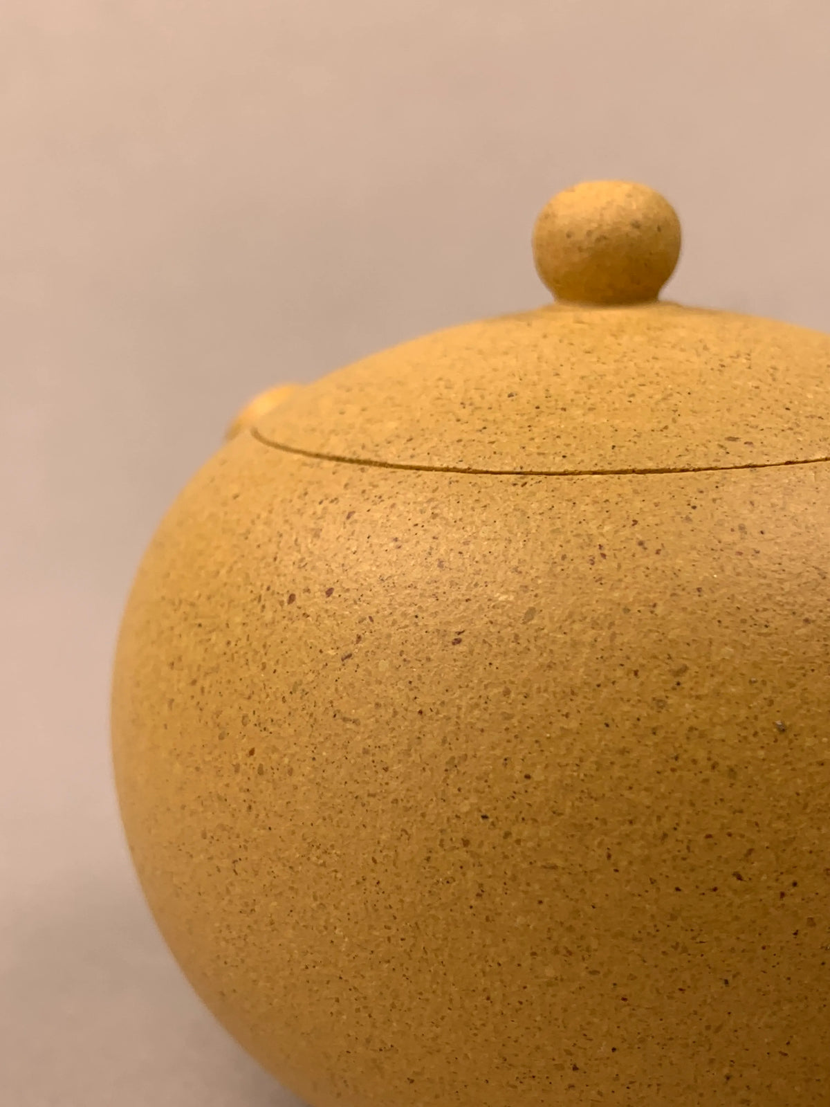 detail of yixing tea pots xi shi on the table