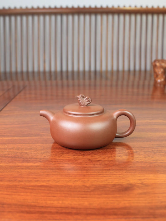 this is a yixing zisha teapot handmade by artist