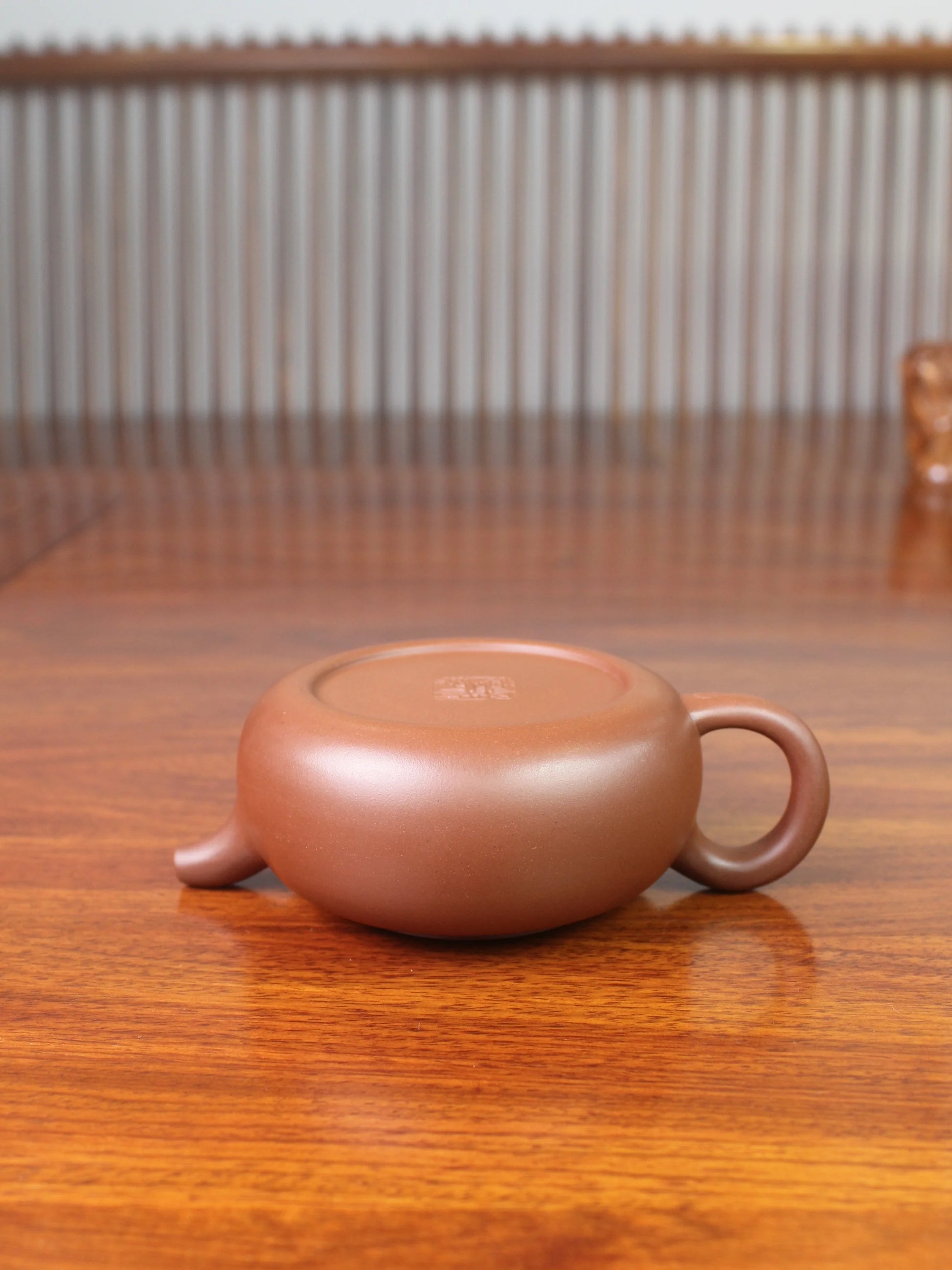the yixing zisha teapot on the table