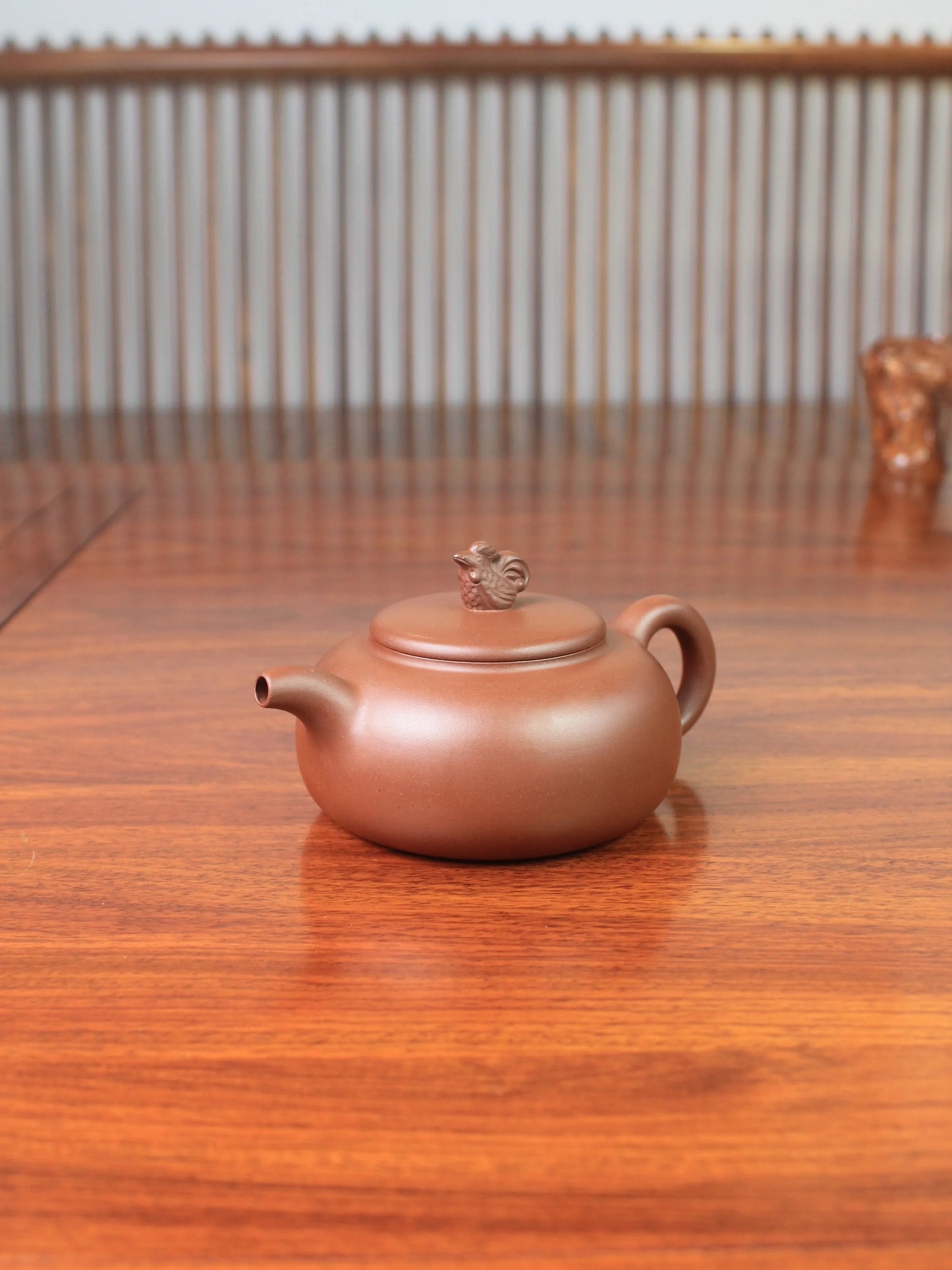 this is the yixing zisha teapot handmade by artist lai xiaohong