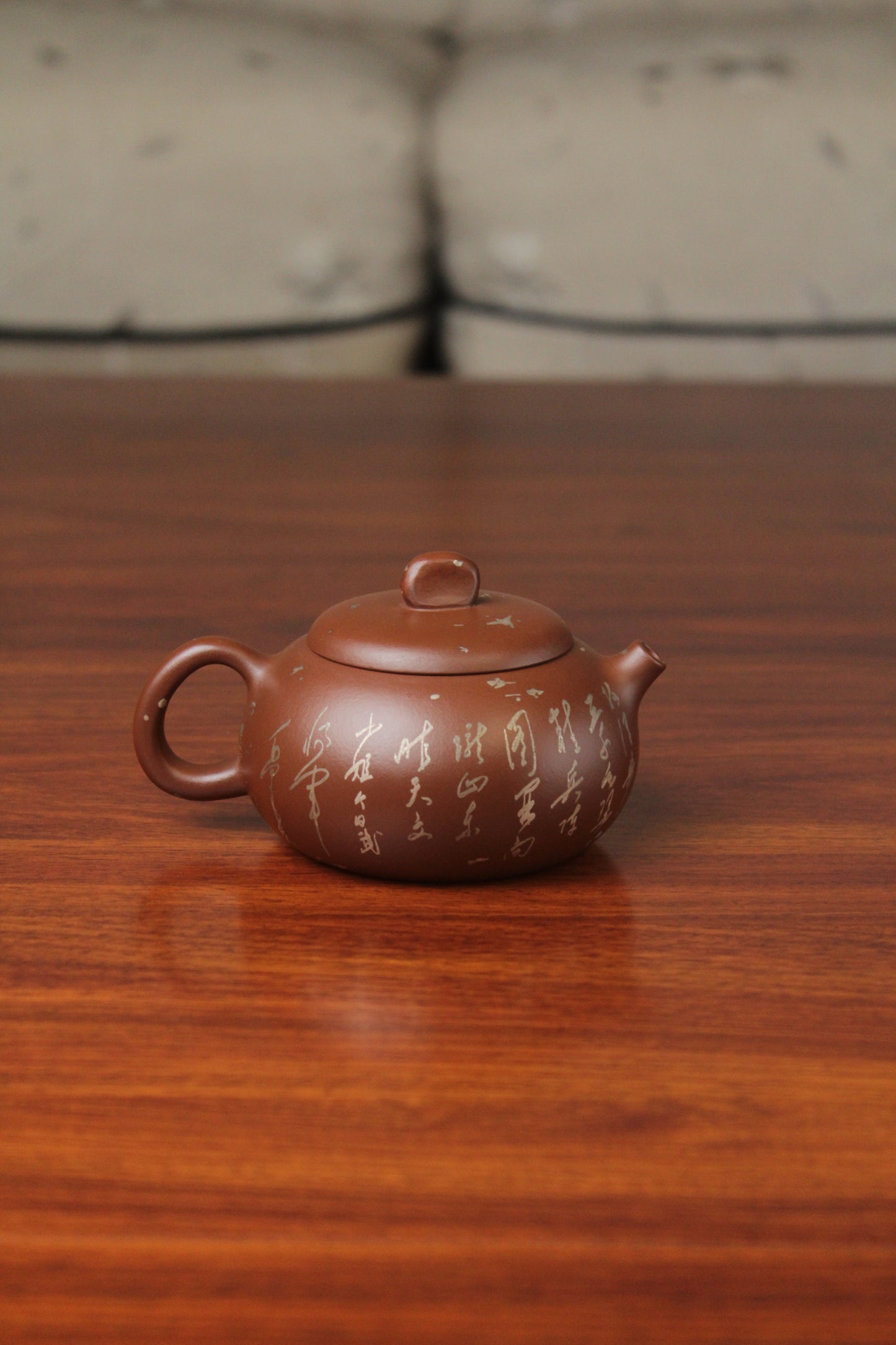 back of the yixing teapot on the table