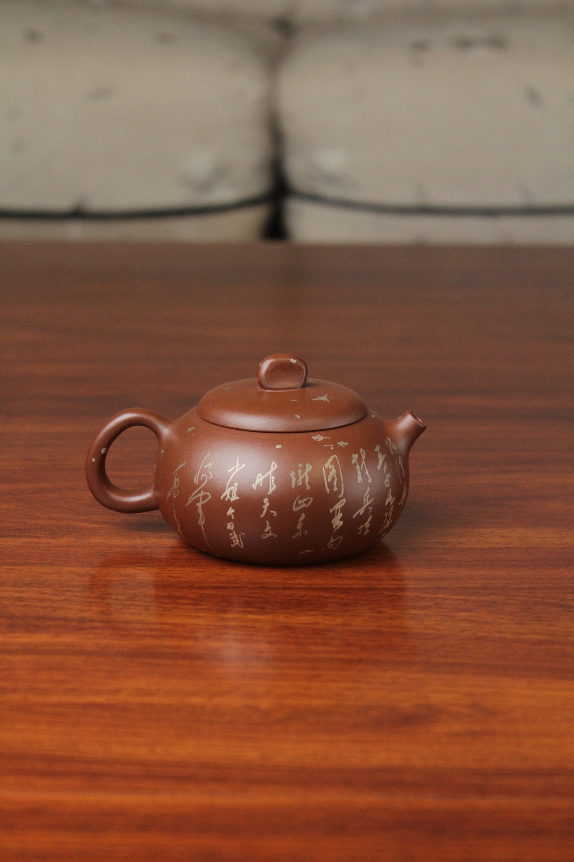 back of the yixing teapot on the table
