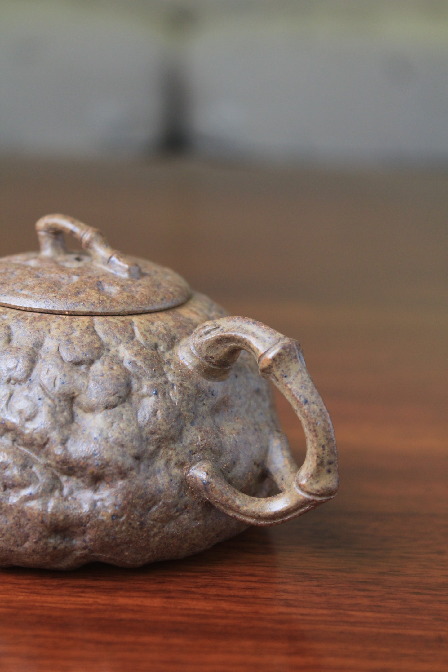 2 handle of yixing teapot gong chun fully handmade with purple clay on the table