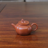 yixing teapot zhu ni shi qiu on the table