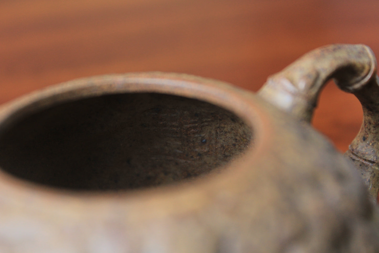 the inside mark of yixing teapot gong chun fully handmade with purple clay