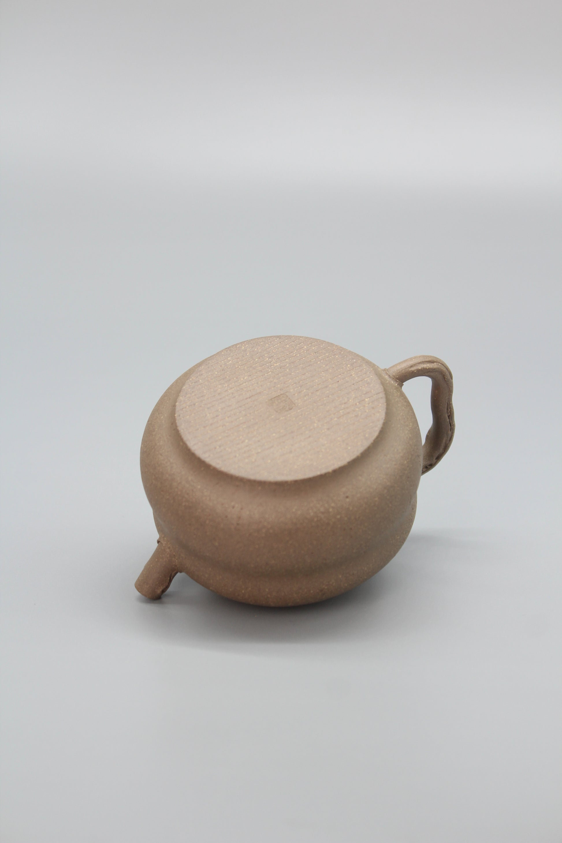 Artistic Yixing teapot bottom
