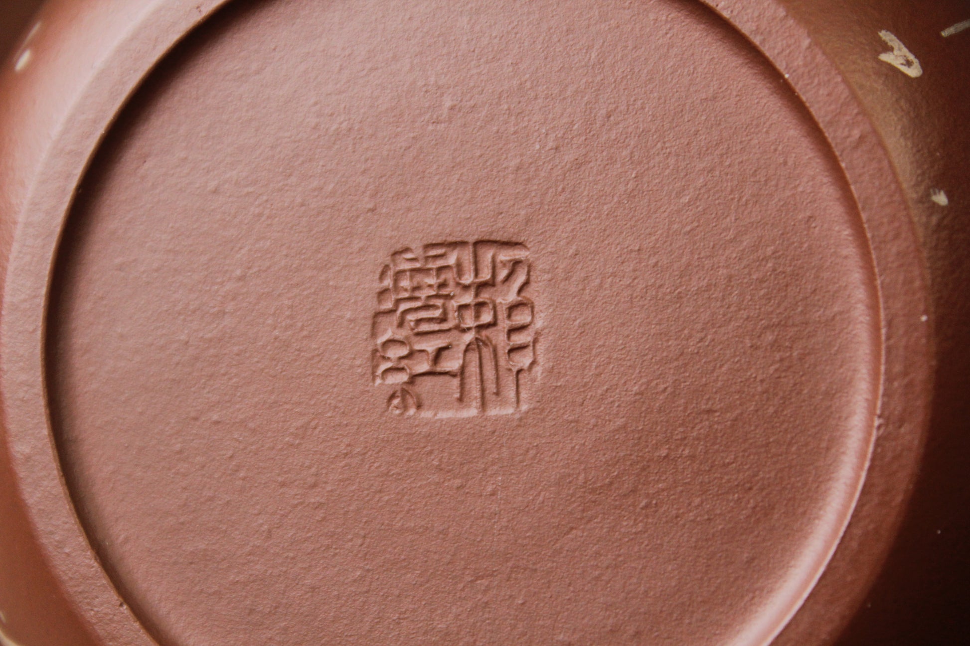 mark of the yixing teapot on the table
