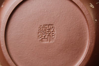 mark of the yixing teapot on the table