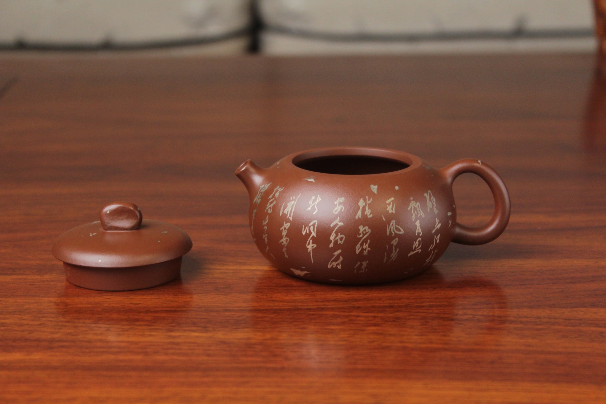 Detail of the yixing teapot on the table