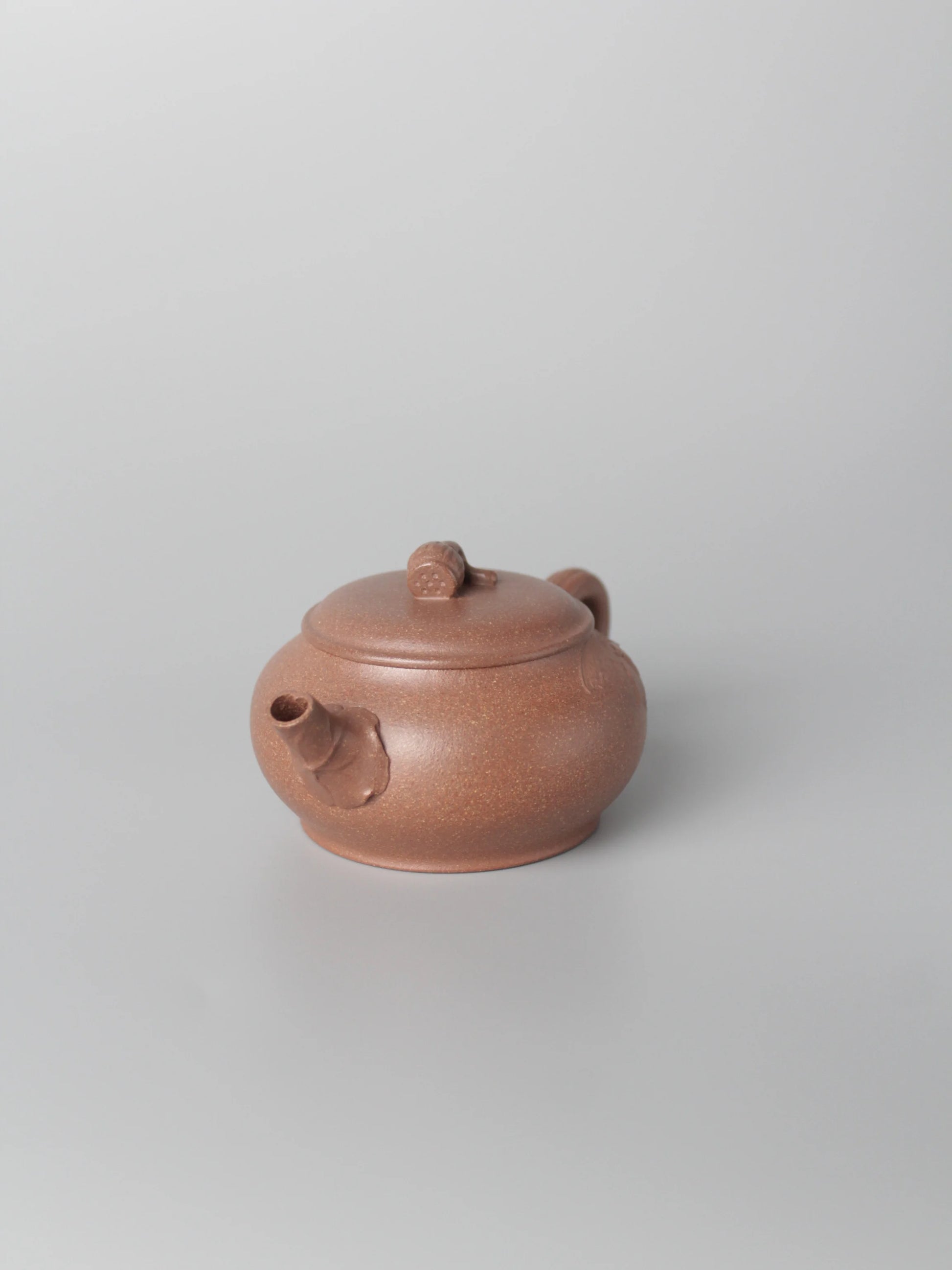 the detail of the yixing teapot named lotus