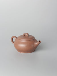 the left view of the yixing teapot named lotus