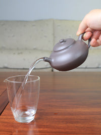 Pour of the yixing teapot handmade named he huan 