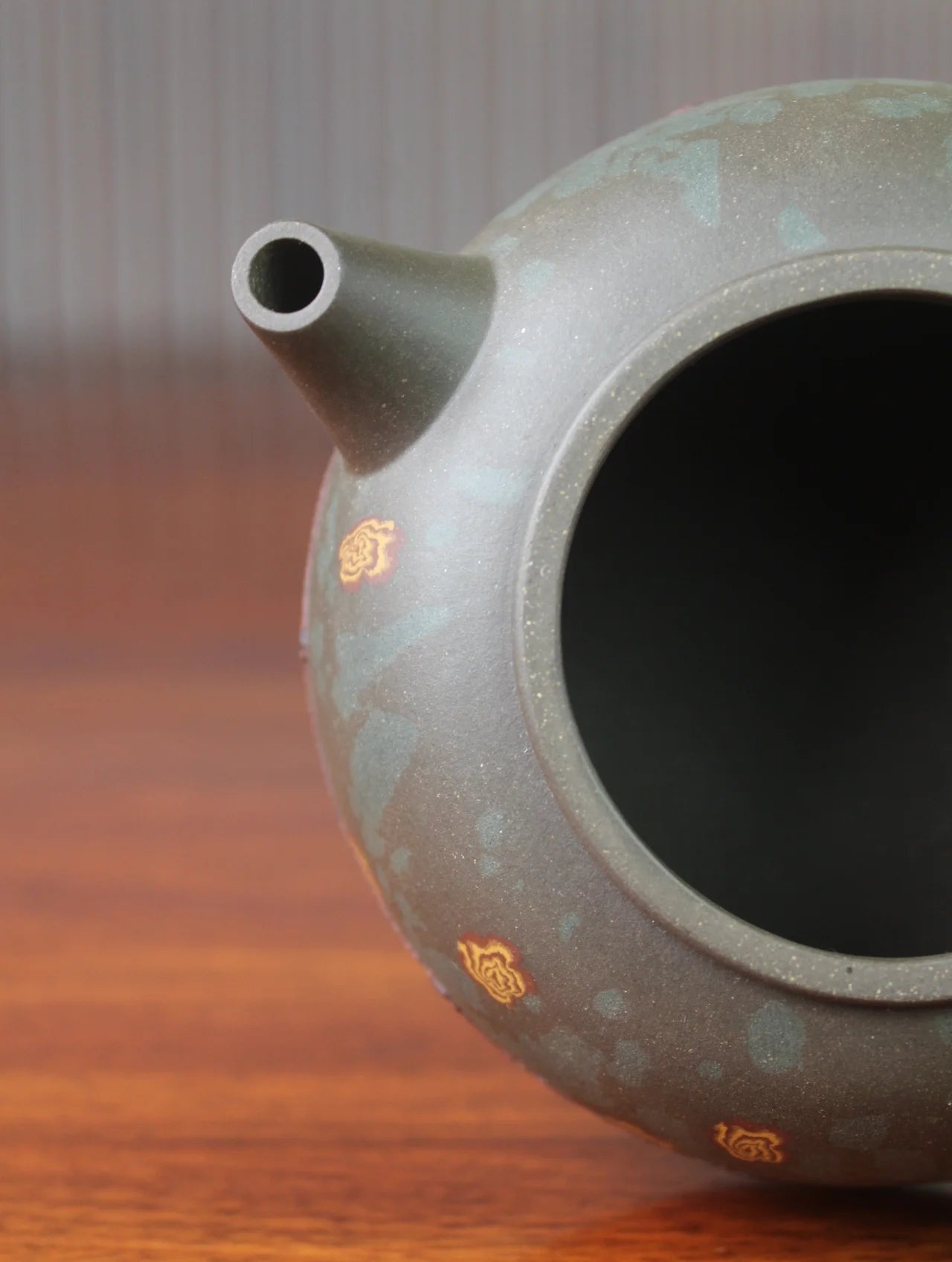 the spout of the yixing teapot named home
