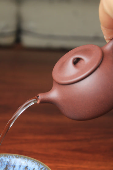 good pour of the collectible teapot