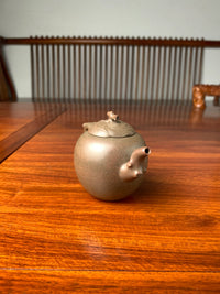 the left view of the yixing teapot handmade with duanni