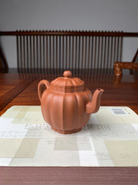 the left view of this yixing teapot handmade