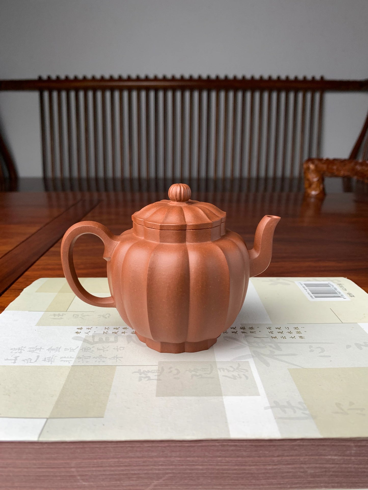 back view of the yixing teapot handmade with di cao qing clay