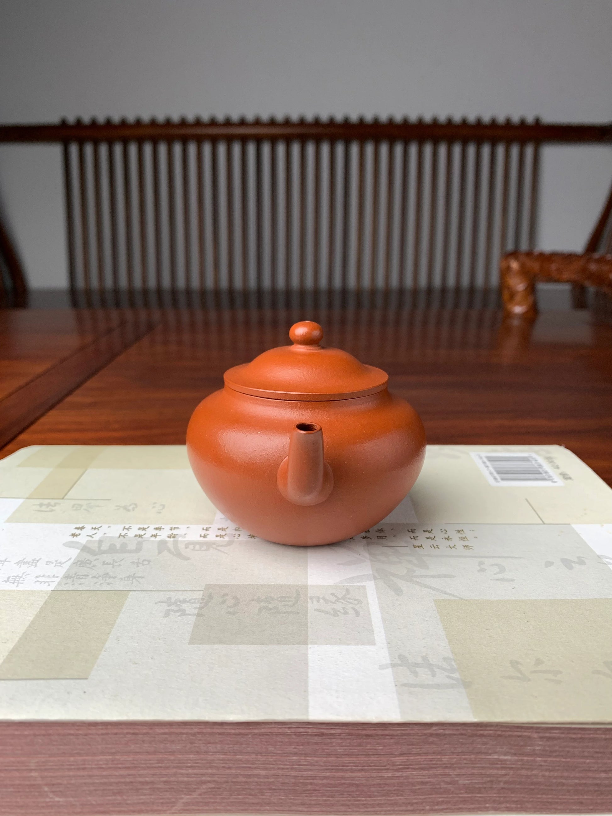 the yixing teapot handmade with yixing ben shan zhuni clay front view