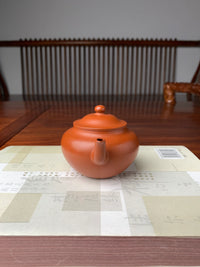 the yixing teapot handmade with yixing ben shan zhuni clay front view