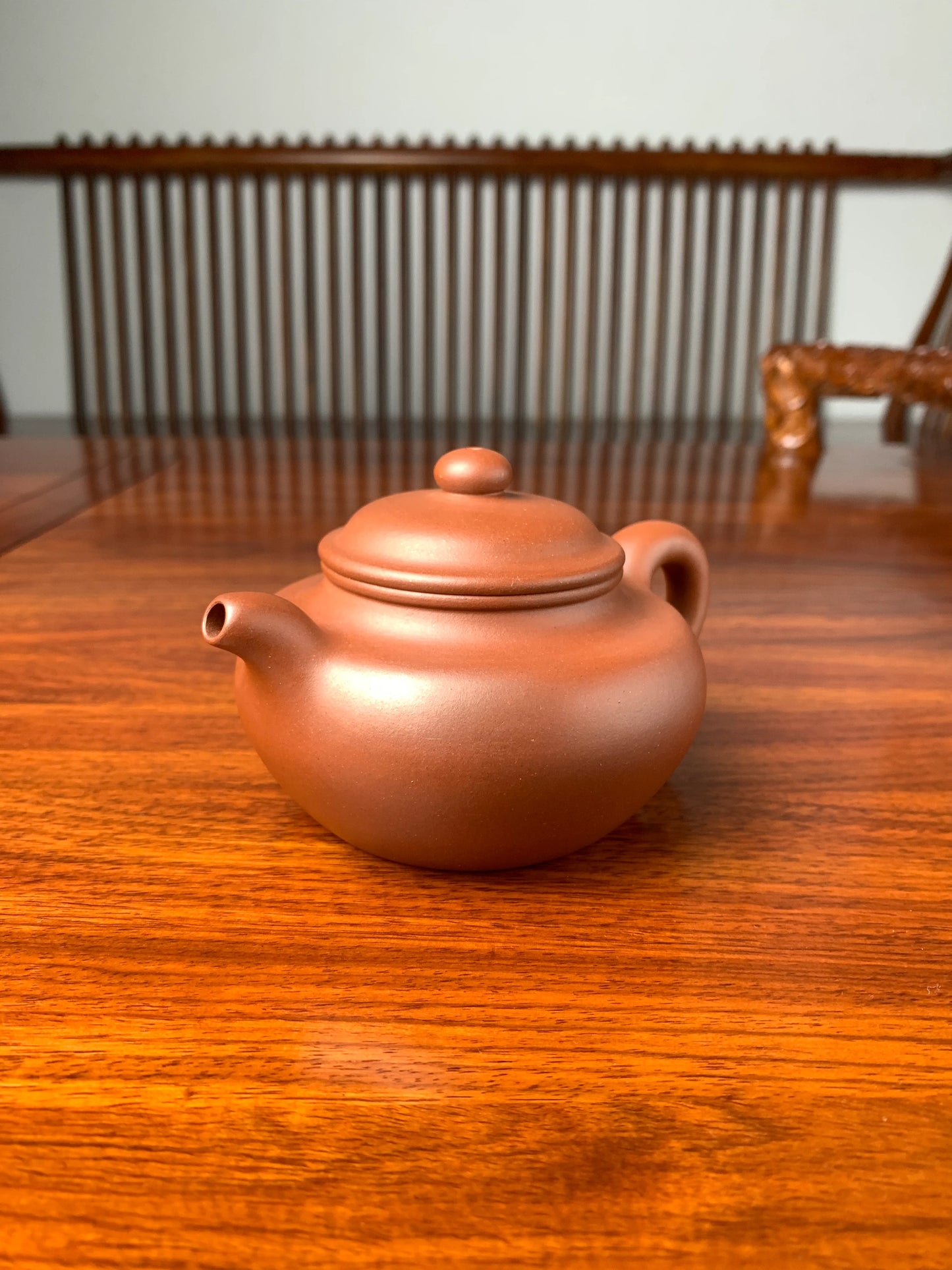 handmade yixing teapot named fang gu on the table right view