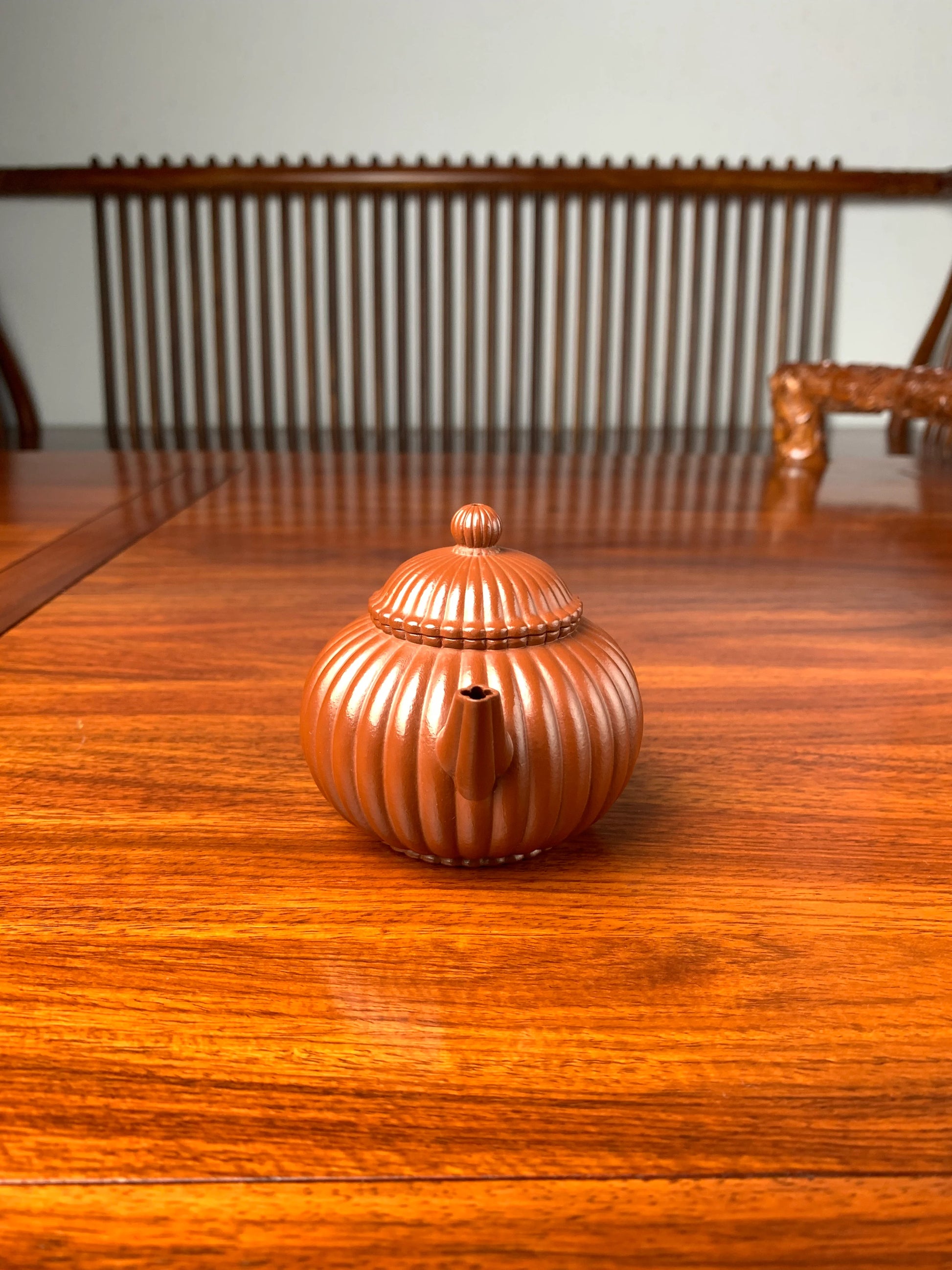 the front view of the handmade yixing teapot named shui ping