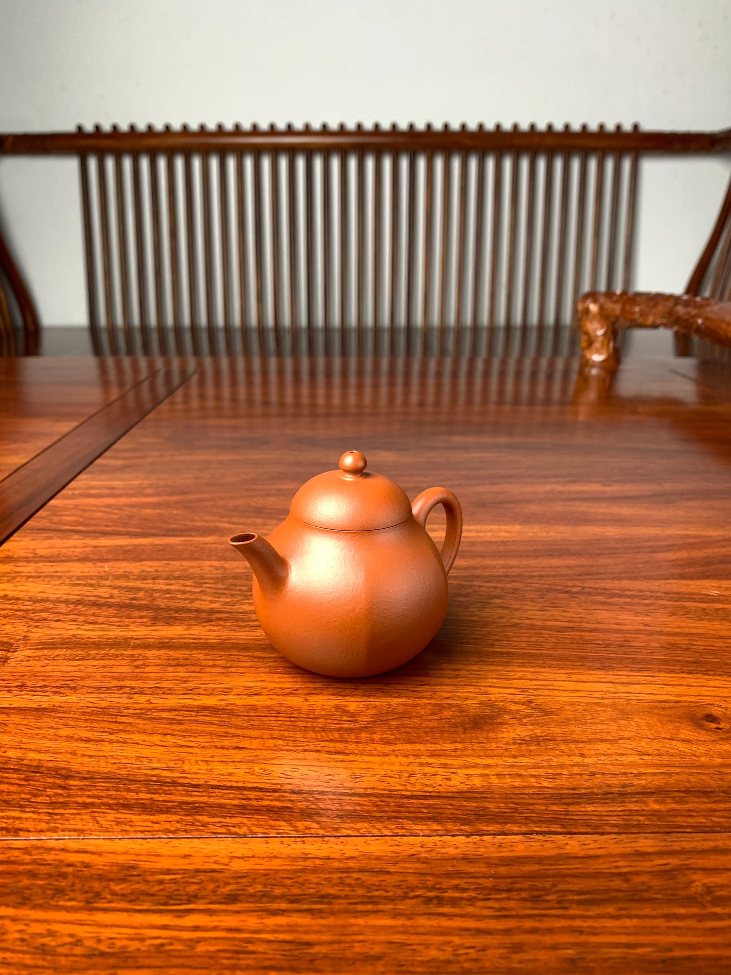 handmade yixing teapot named liu he on the table right view