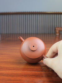 Top view of the Yixing teapot Ju Lun handmade with Zisha clay