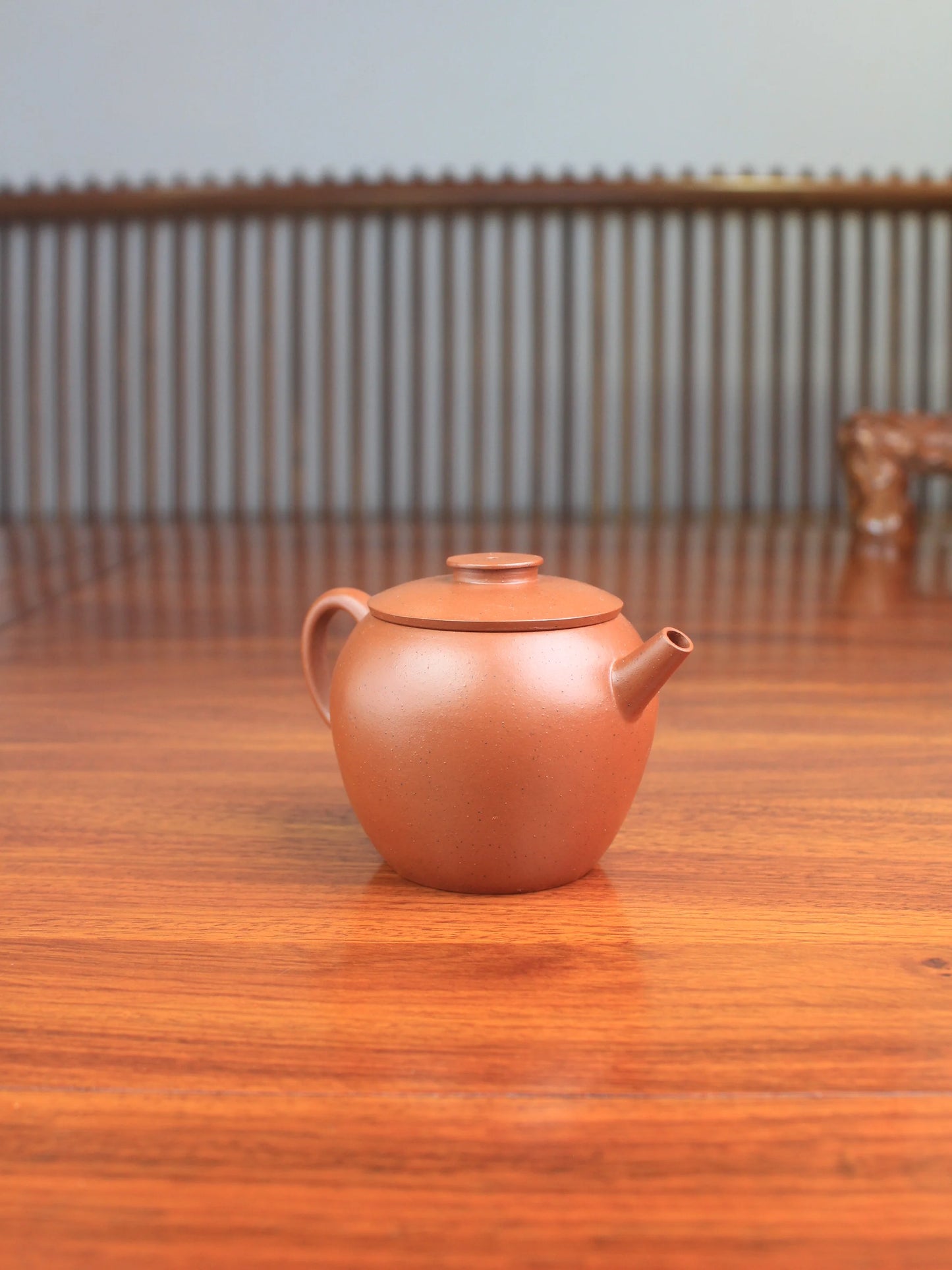 left view of the Yixing teapot Ju Lun handmade with Zisha clay