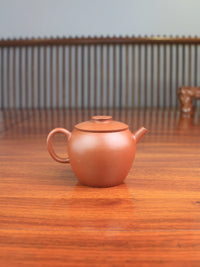 back view of Yixing teapot Ju Lun handmade with Zisha clay