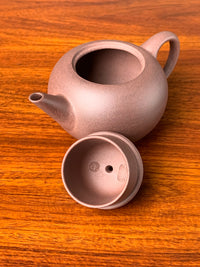 two teapot marks of potter in the lid