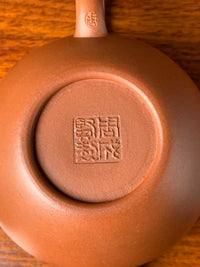 the teapot mark of zhou chen xian on the teapot bottom