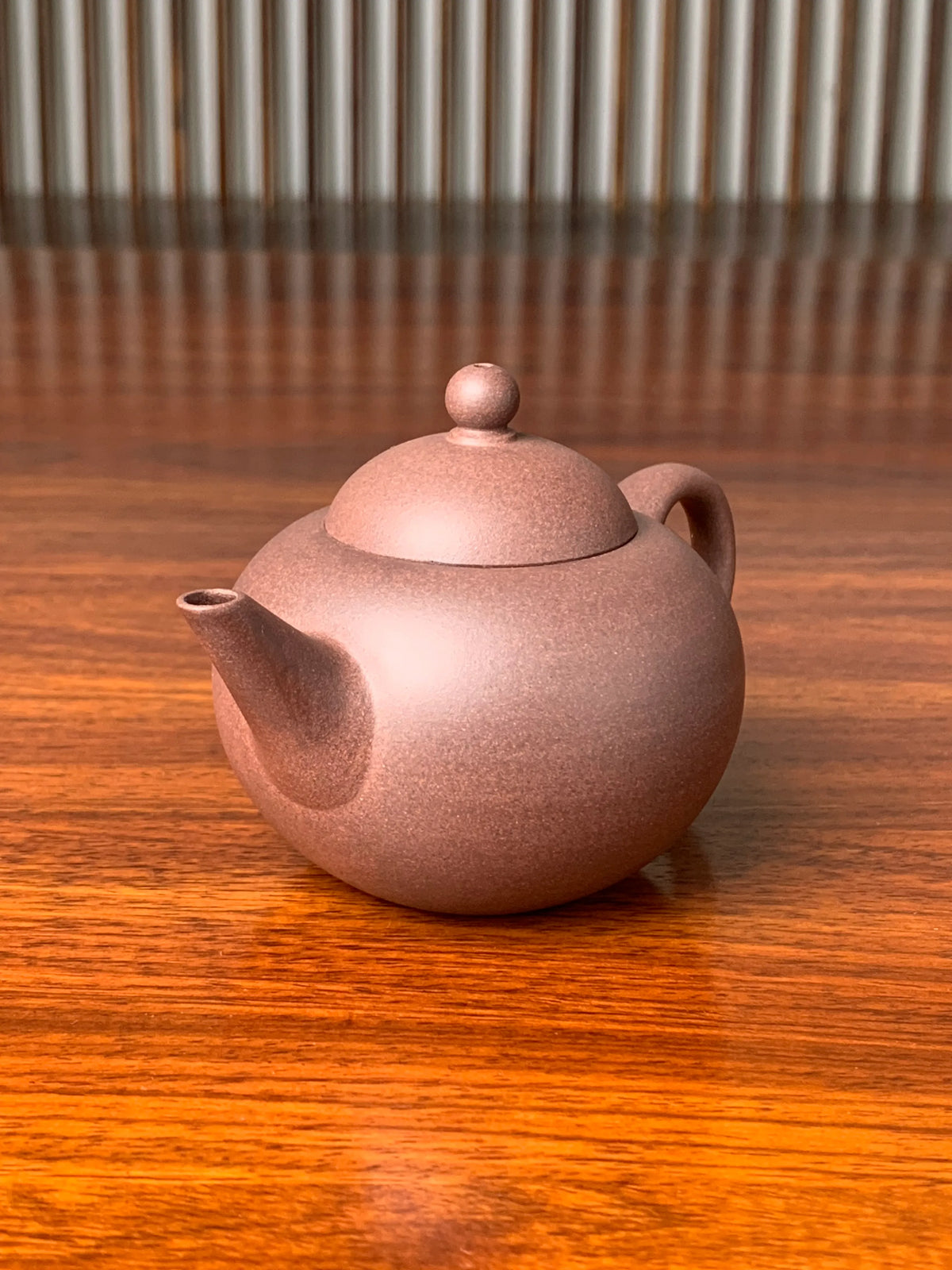 the right view of the handmade yixing zisha clay teapot qian gai shui ping