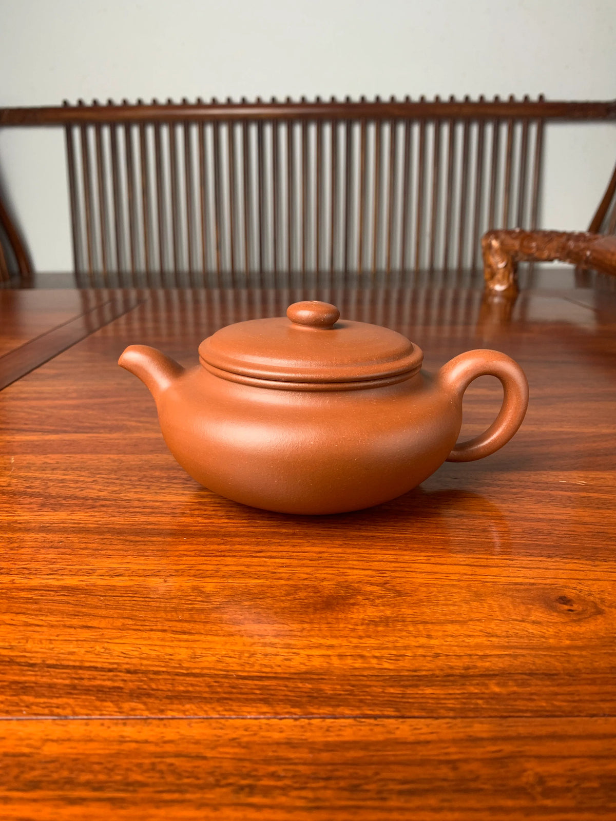 yixing zisha clay teapot bian fu on the table