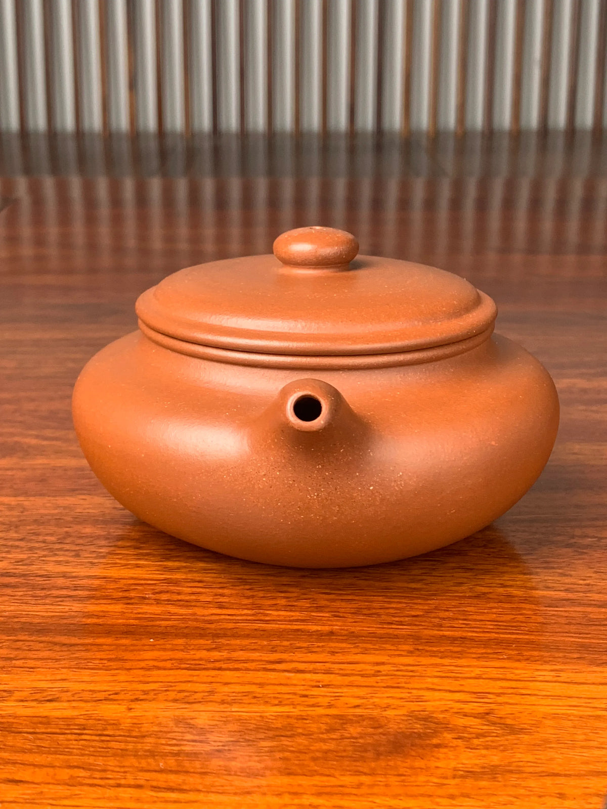 the front view of the yixing zisha clay named bian fu
