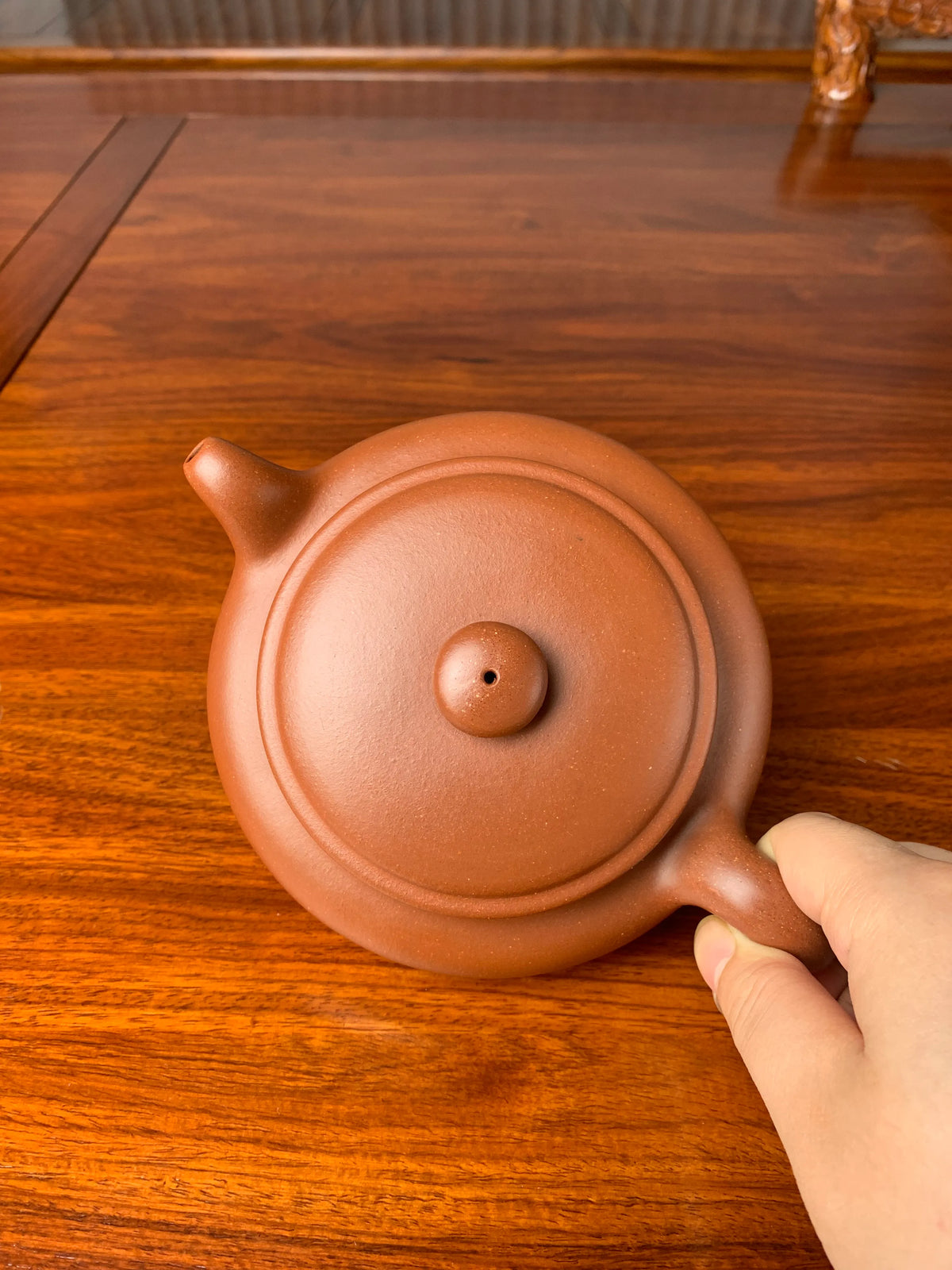 Looking down at the yixing zisha clay teapot bian fu