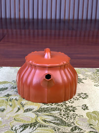 the front view of yixing zisha clay teapot lian yun