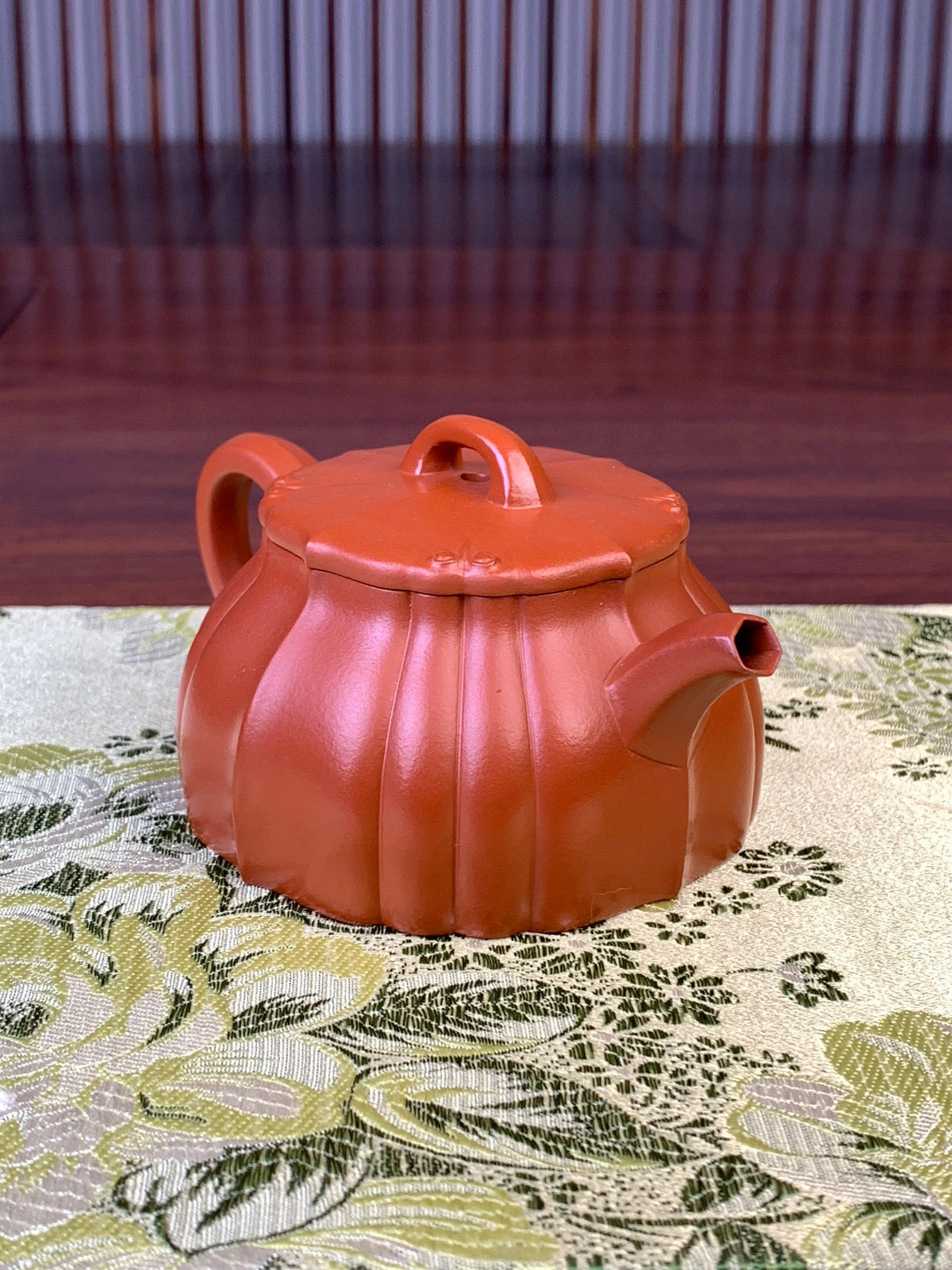 the left view of yixing zisha clay teapot lian yun