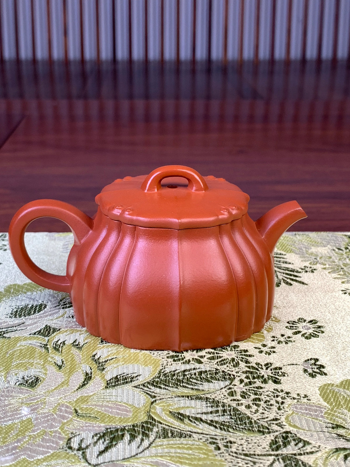 the back view of yixing zisha clay teapot lian yun