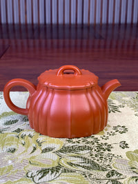 the back view of yixing zisha clay teapot lian yun