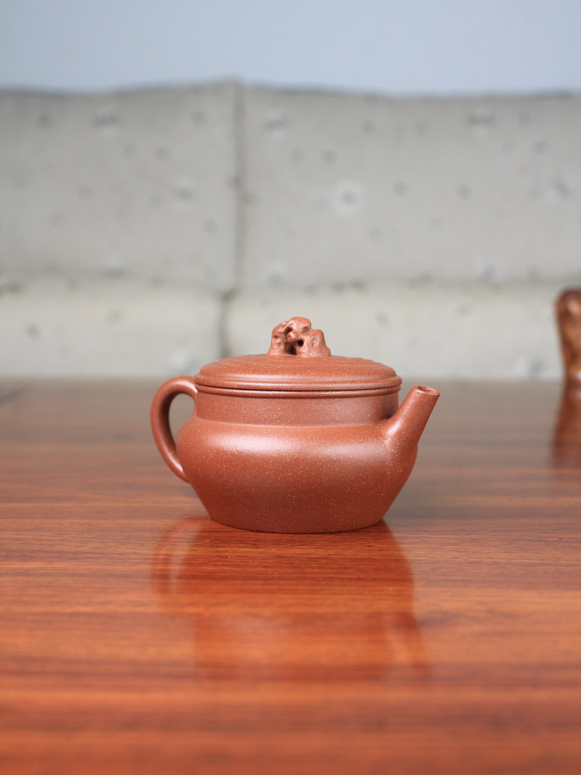 left of yixing zisha teapot handmade by teapot artist