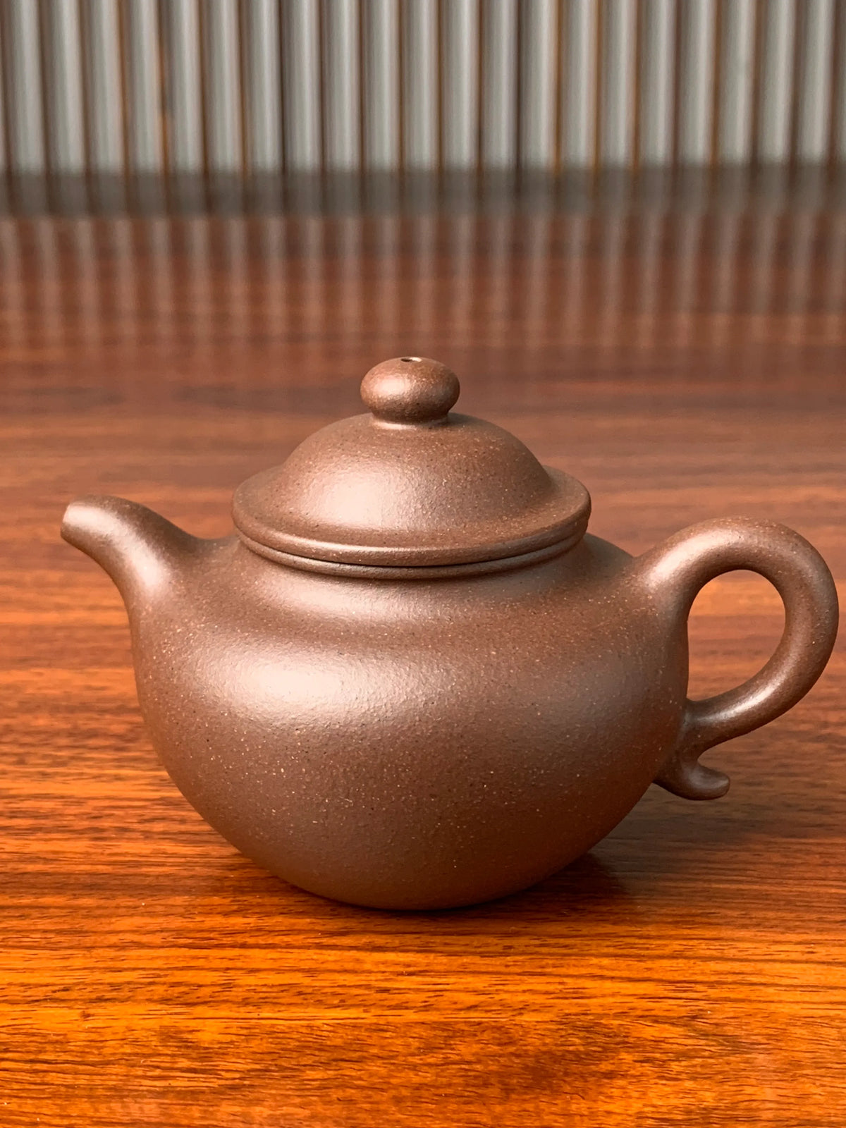 the front view of the yixing zisha teapot lian zi 