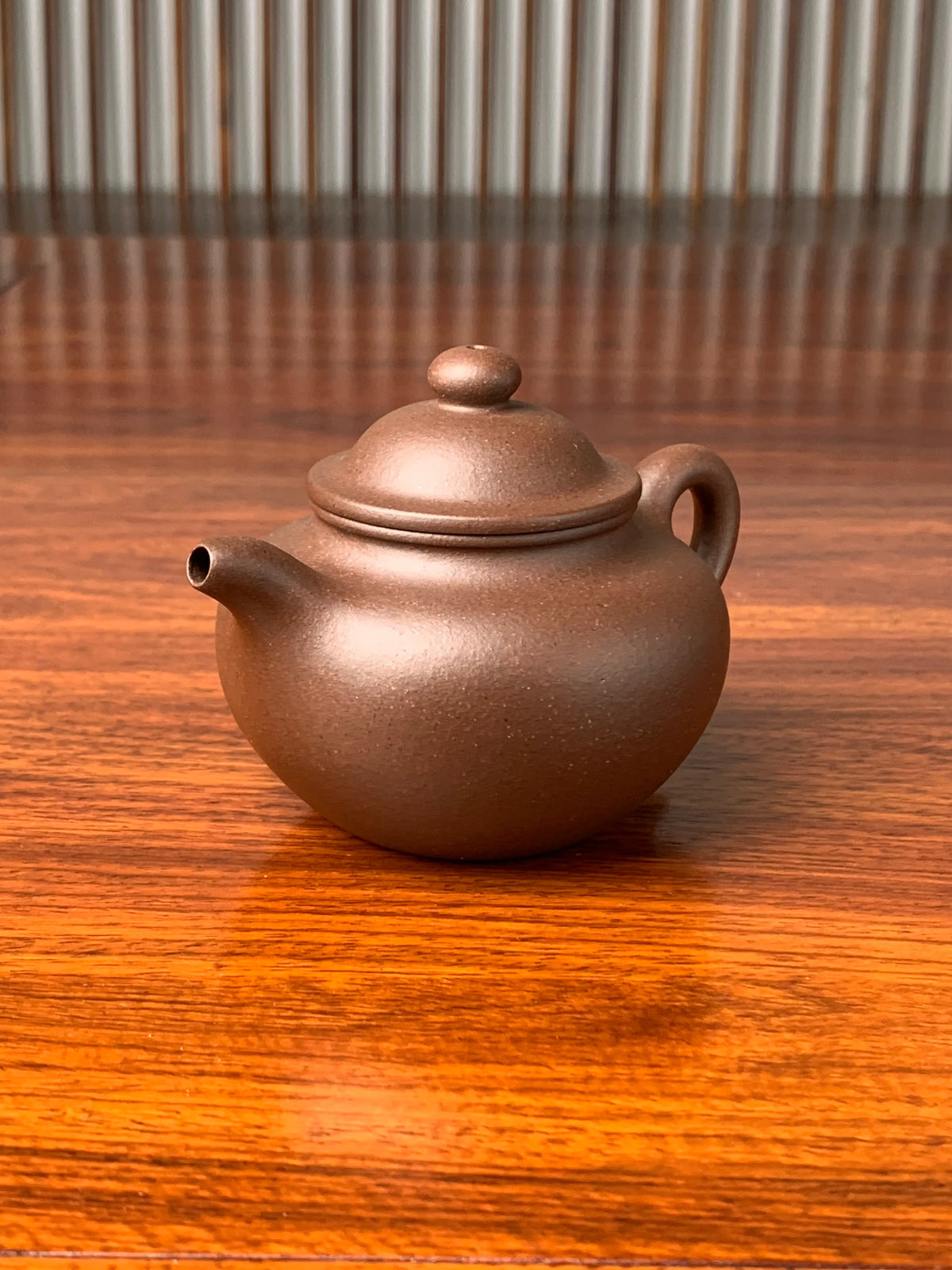 the left view of the yixing zisha teapot lian zi 