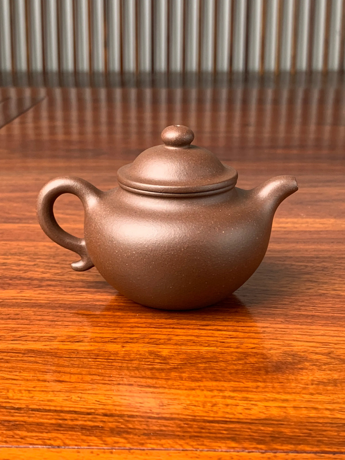 the back view of the yixing zisha teapot lian zi 