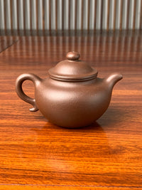 the back view of the yixing zisha teapot lian zi 