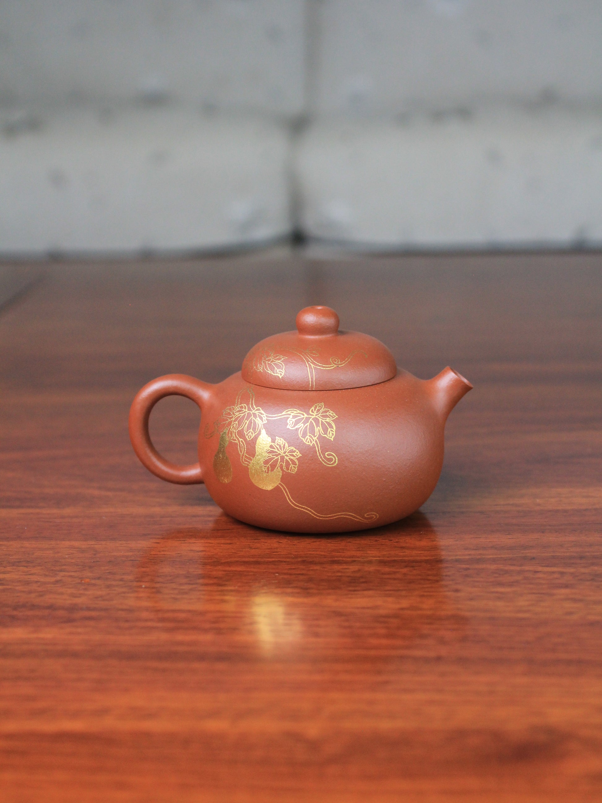Back of the zhuni teapot from zisha art gallery on the table